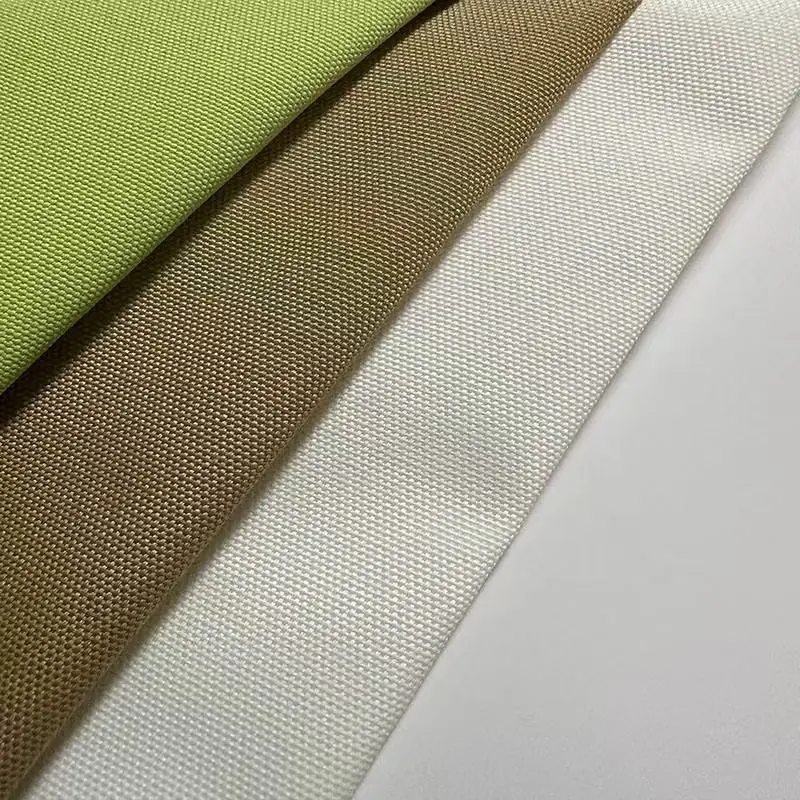 Green khaki and white poly-cotton and cotton canvas fabric swatches