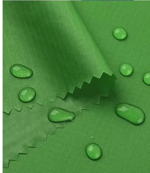 Green silicone-coated nylon fabric with water droplets